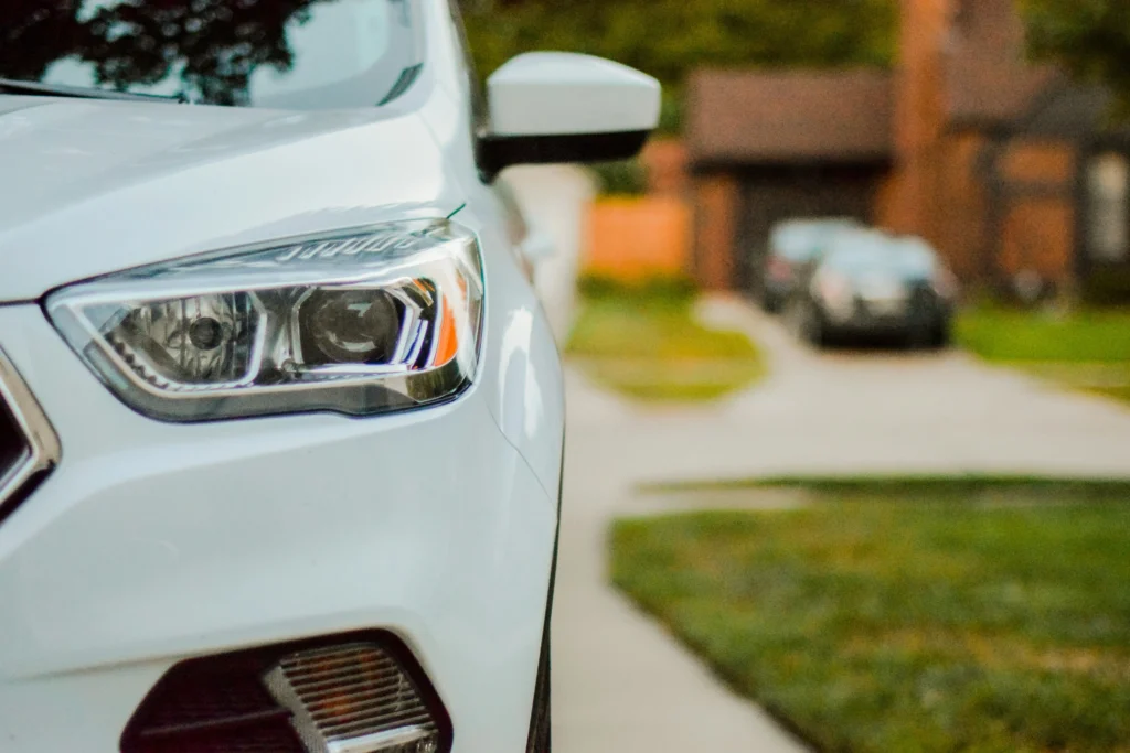 White car in driveway