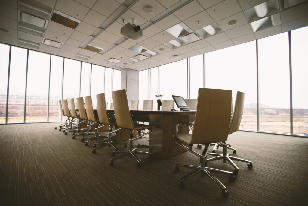 empty conference room with table and chairs